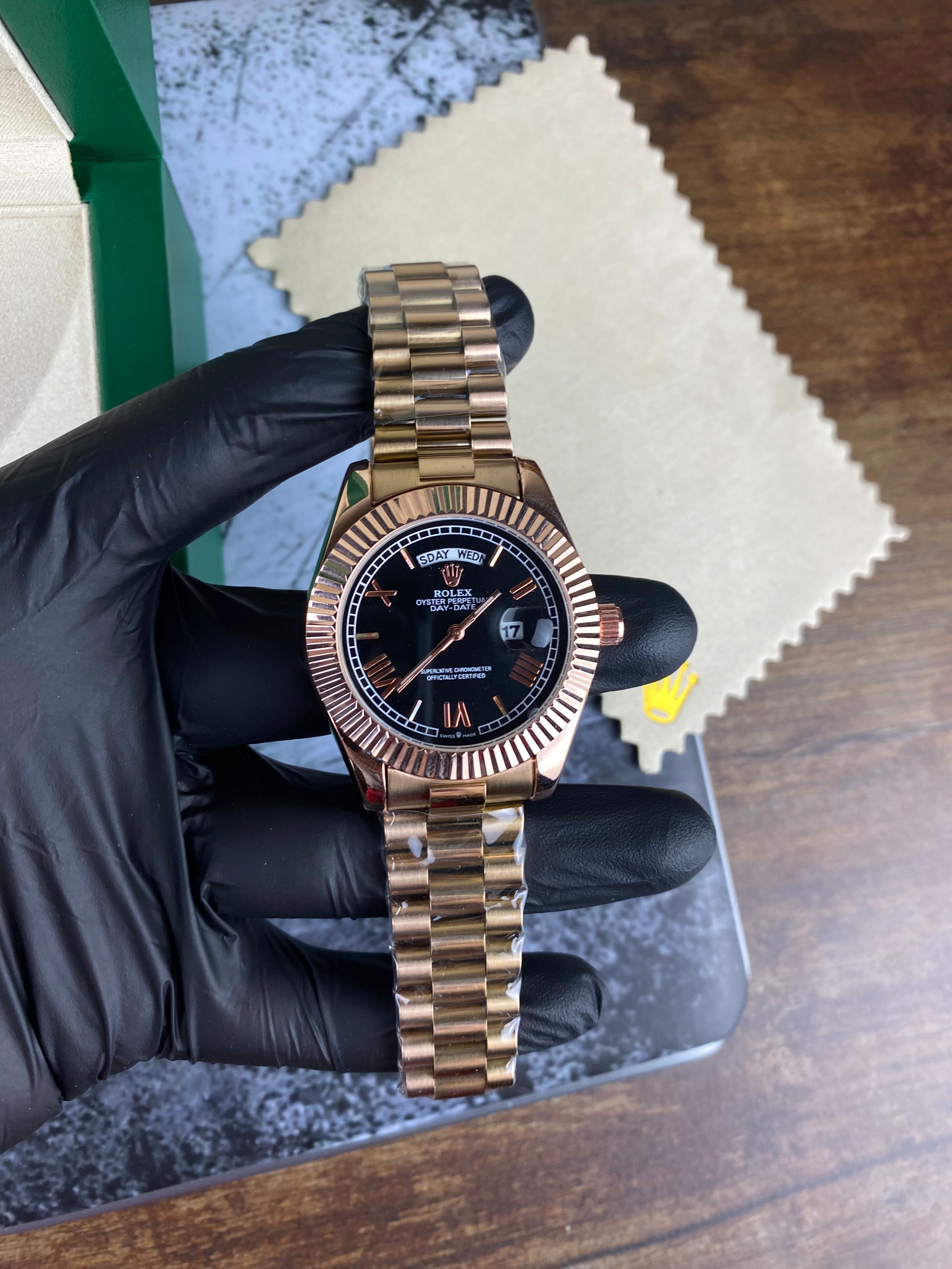Rolex Day-Date 40 Everose gold with black dial