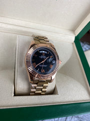 Rolex Day-Date 40 Everose gold with black dial