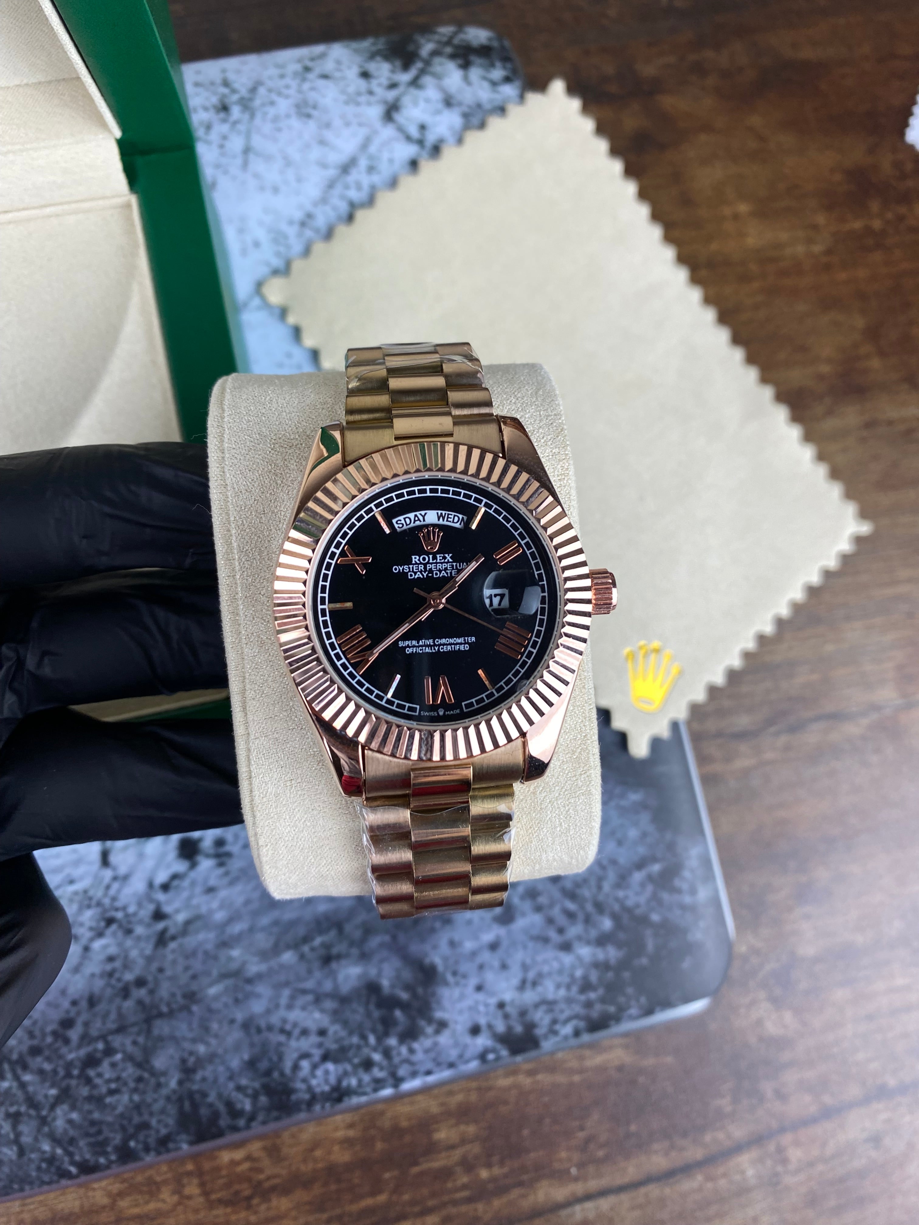 Rolex Day-Date 40 Everose gold with black dial