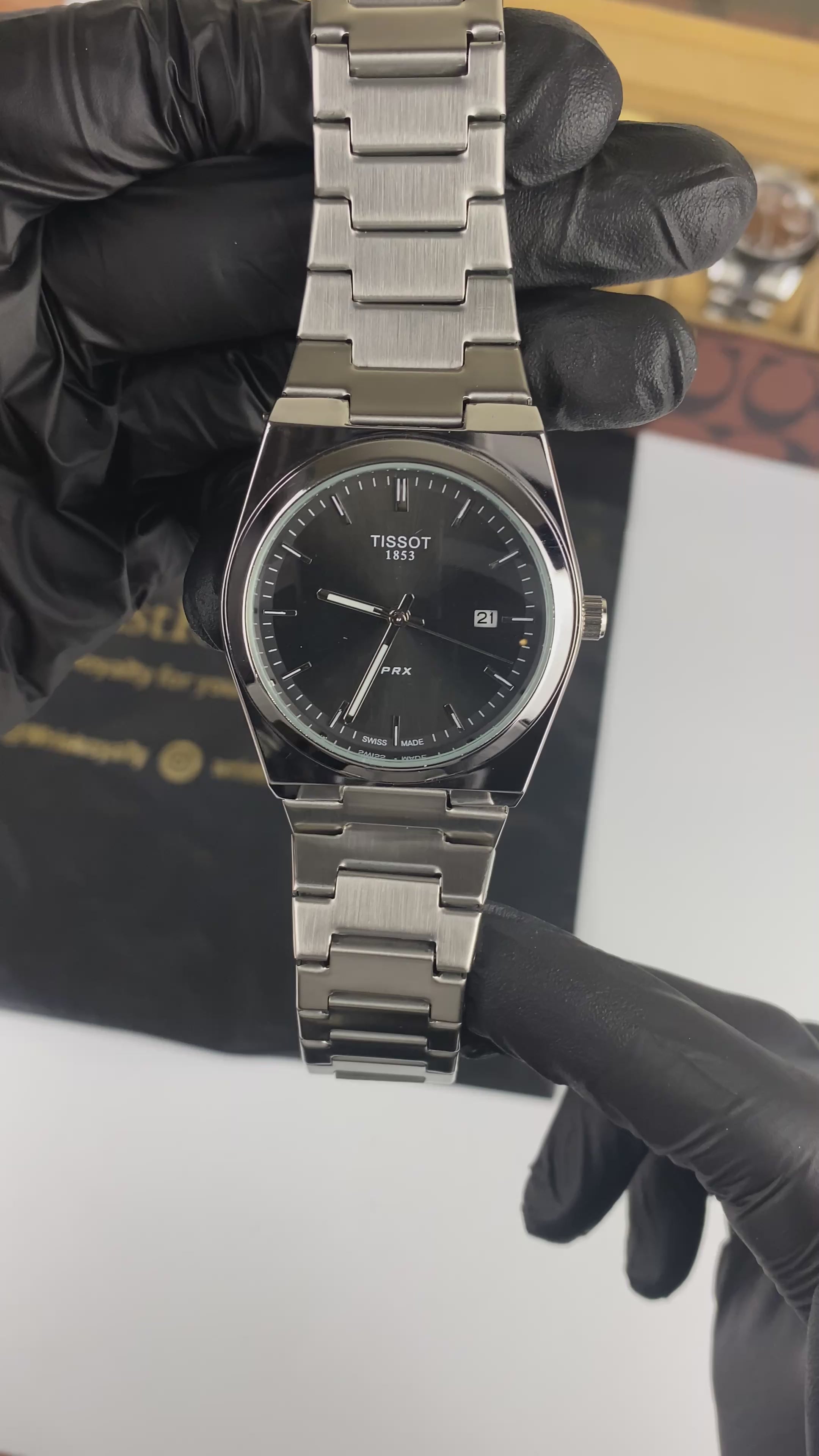 Load video: Tissot PRX Quartz – Black Dial