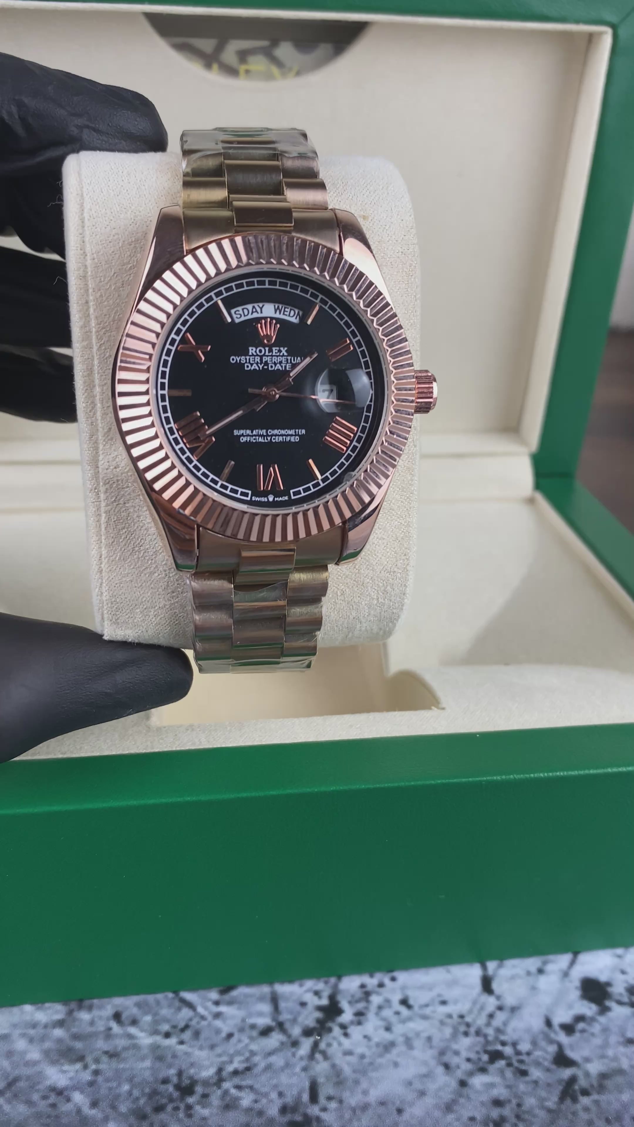 Load video: Rolex Day-Date 40 Everose gold with black dial