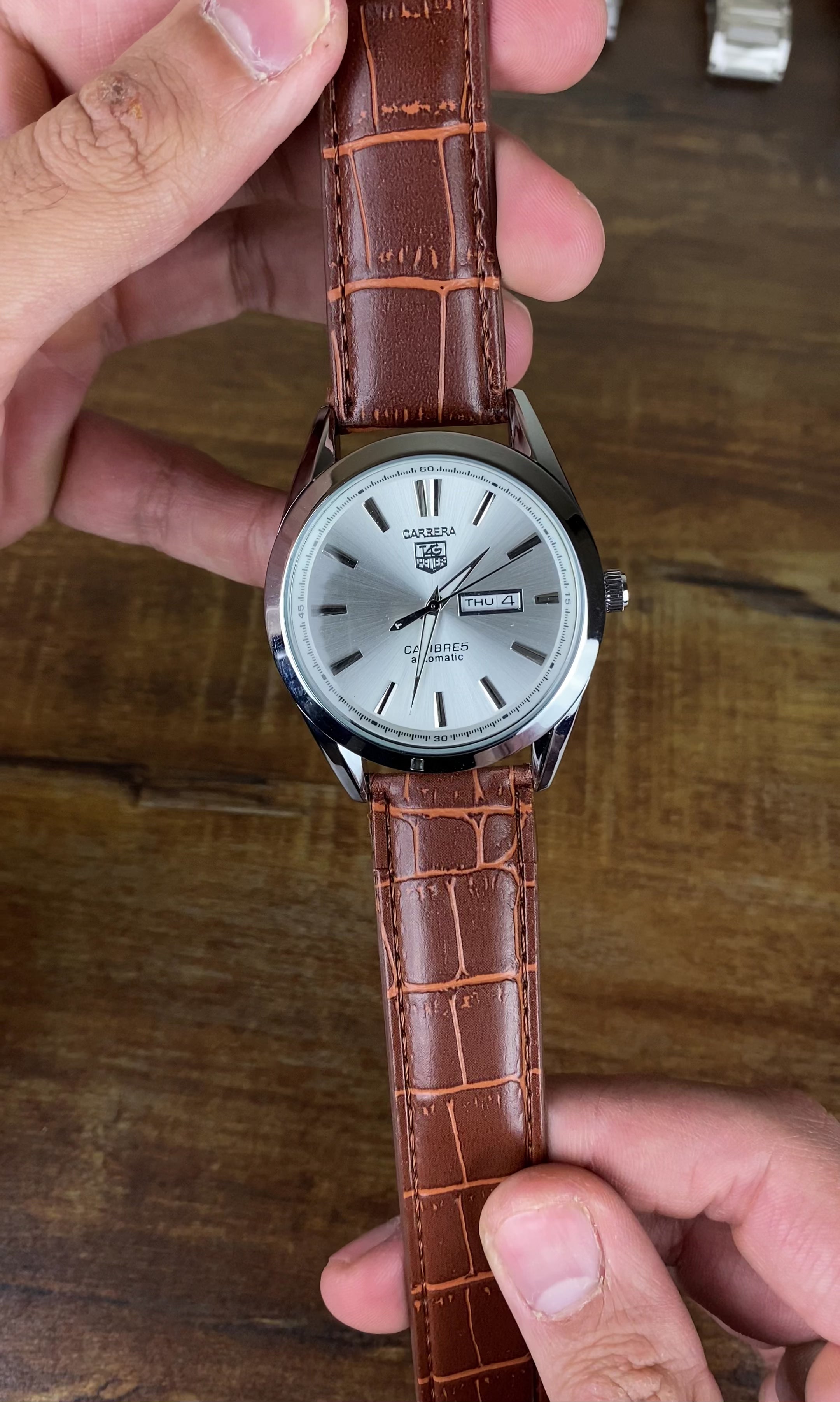 Load video: TAG Heuer Carrera Calibre 5 Day-Date Automatic – Silver Dial Brown Leather Edition
