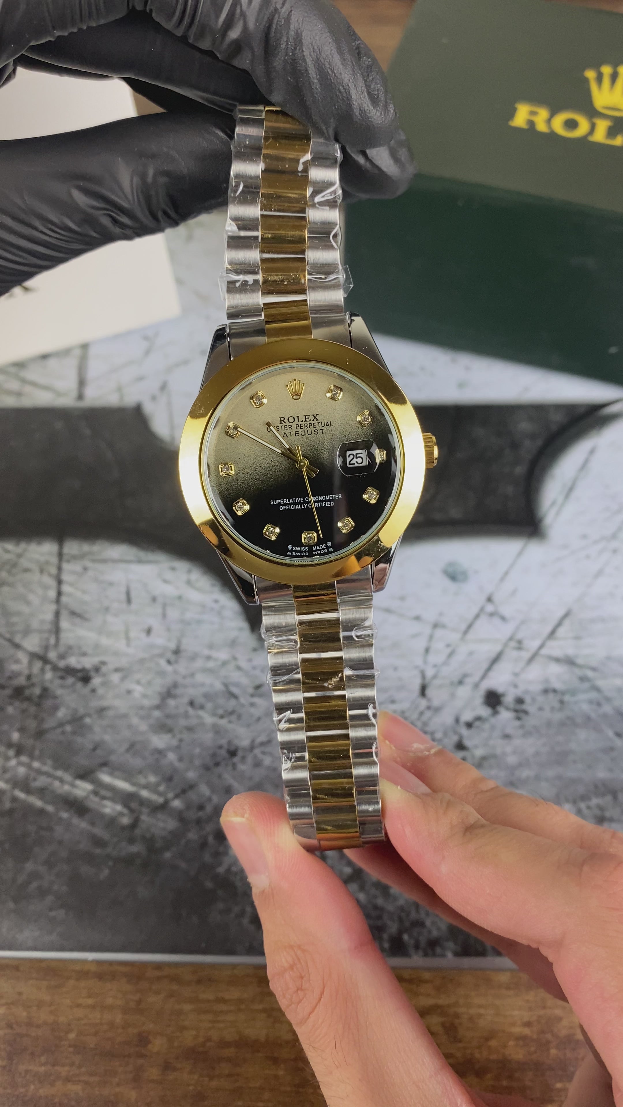 Load video: RLX – Royal Gold Black Diamond Date Quartz Dial